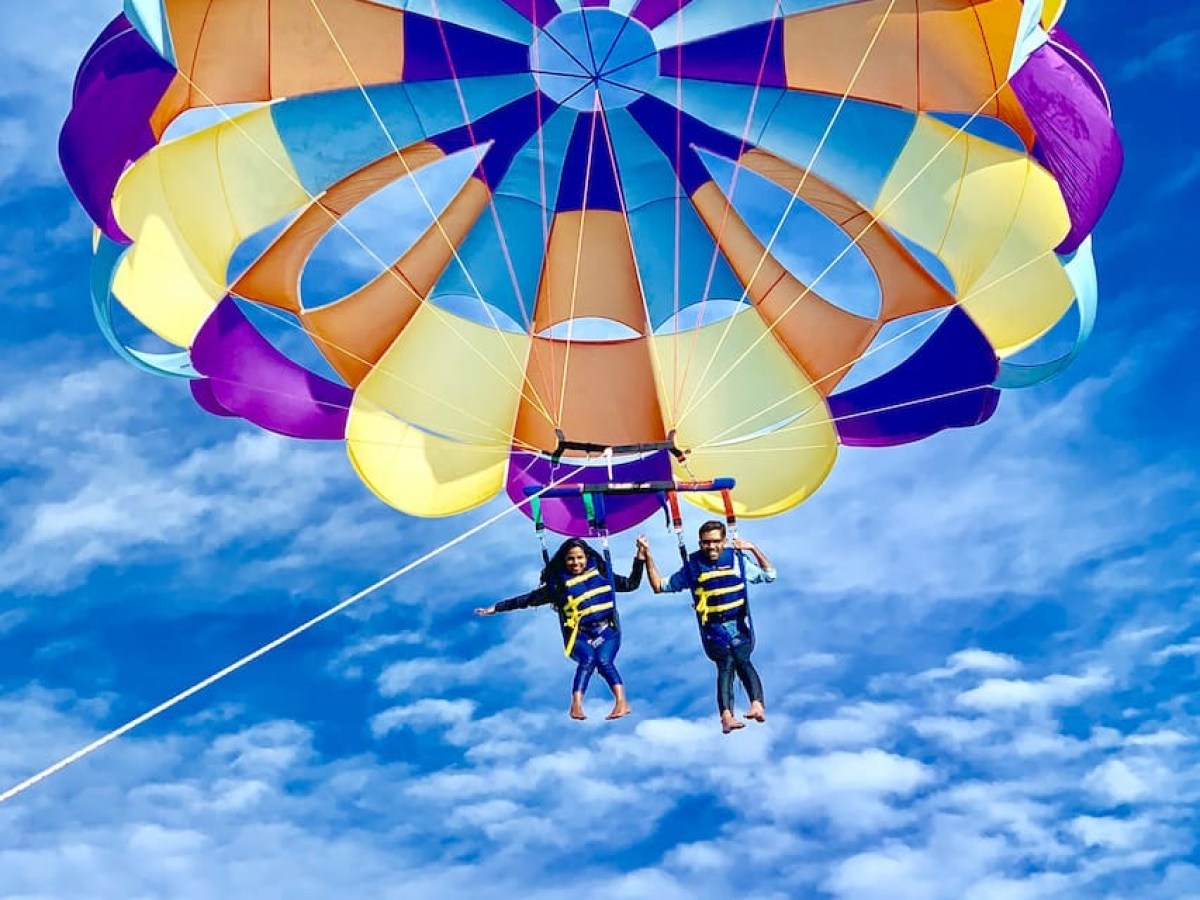 a parachute with a blue umbrella